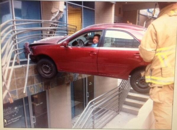 A man is stuck in his car after he crashed in a hospital parking