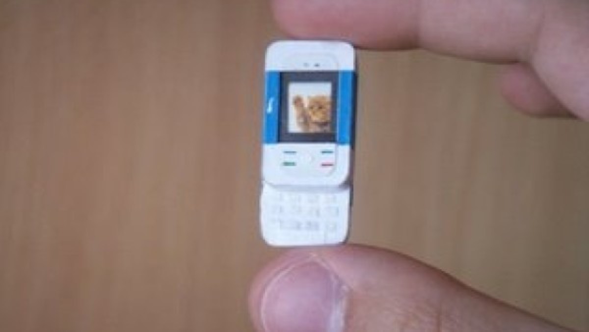 Фотография маленького телефона. Nokia 5200. Нокиа 5200 сенсорный. Маленький телефон. Самый маленький телефон Nokia.